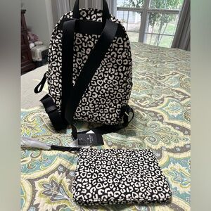 Brand New Kate Spade Back Pack with matching wallet.